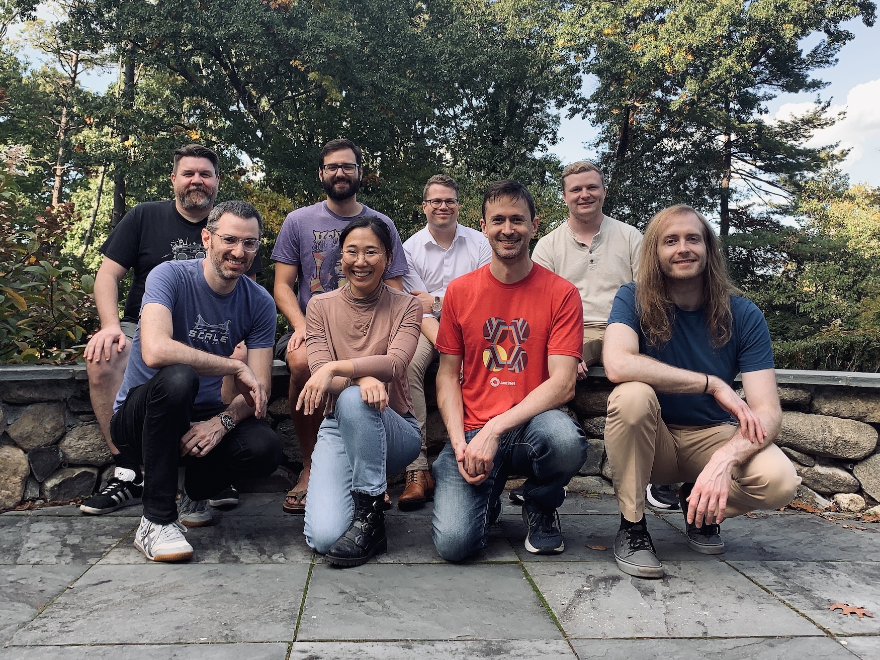 Photo of the Unison team outside, arranged in two rows.